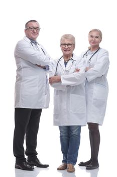 in full growth. successful General practitioners standing together. isolated on a white background