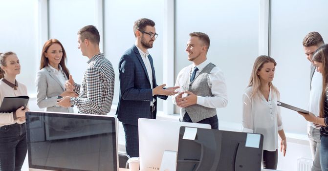 workplace employees in a modern office. photo with copy space