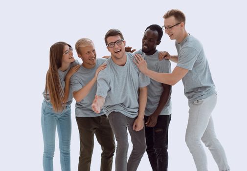 in full growth. group of diverse young people in identical t-shirts. isolated on white background