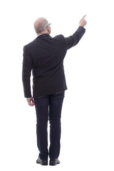 rear view. business man looking at a large white screen. isolated on a white background
