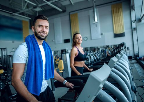 close up. an attractive man works in a modern gym. healthy lifestyle