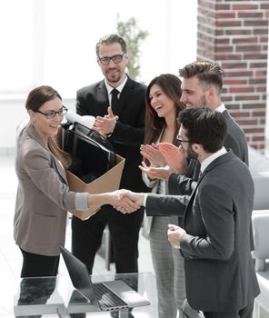 boss shaking hands with a new employee.photo with copy space