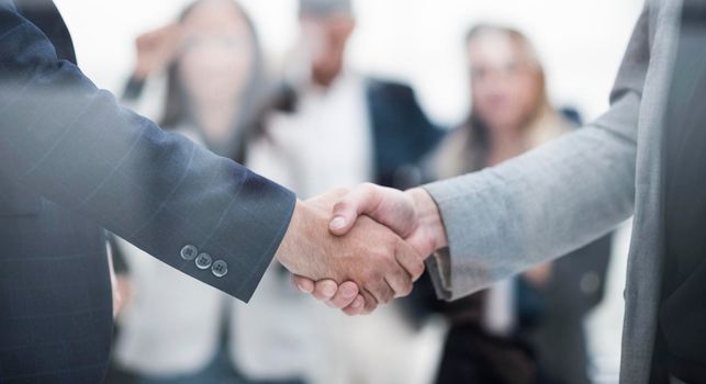 close up. confident business handshake on an office background. concept of partnership