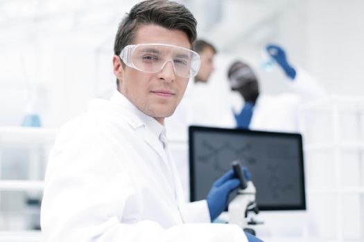 close up. scientist microbiologist at the laboratory table .science and technology