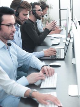 business team of the business center working in the office . vertical photo