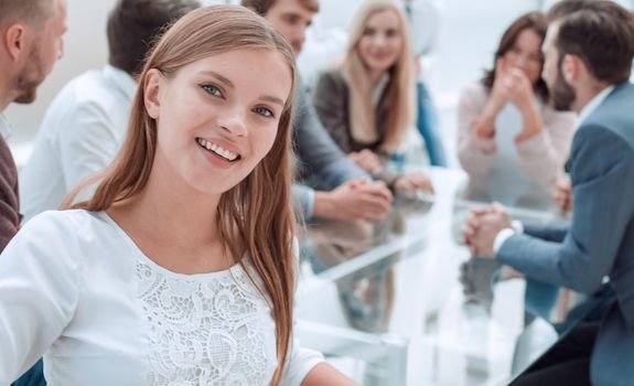 young company employee standing in business office. business concept