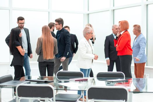 Office workers in a modern lobby, group portrait