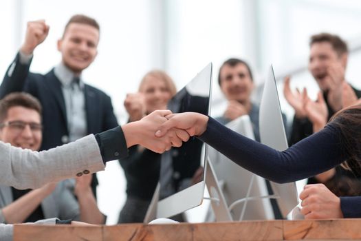 two business women confirming the deal with a handshake . concept of success