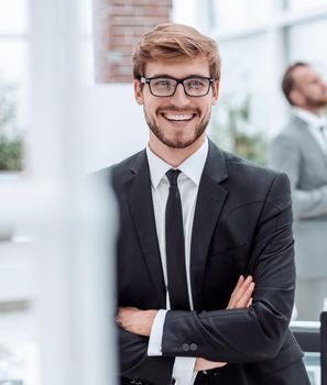 close up. smiling business men talking to his colleague