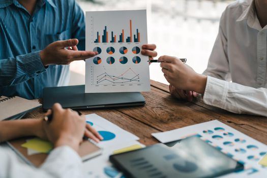 Businessman meeting and working with financial report, talking about business plan for investment, finance analysis concept.