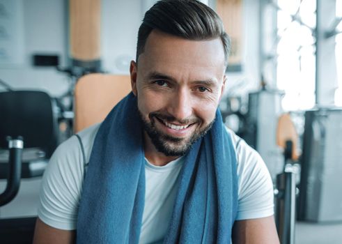 close up.portrait of a sporty young man in the gym .healthy lifestyle