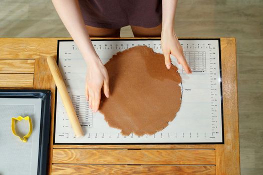 Silicone baking mat with markings during cooking. Top view