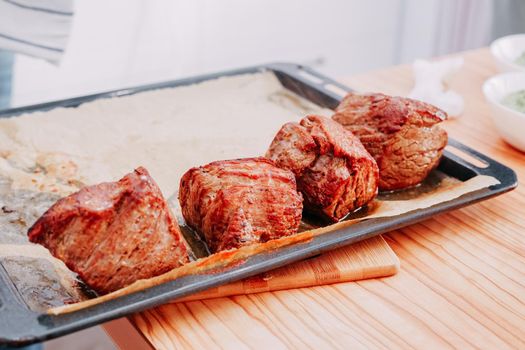 Raw beef sliced, preparation of meat for cooking steak at the culinary master class. home-made food, cooking at home