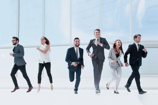 business team in a spacious office hall .photo with copy space