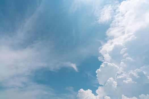 Beautiful blue sky and white cumulus clouds abstract background. Cloudscape background. Blue sky and fluffy white clouds on sunny day. Nature weather. Beautiful blue sky for happy day background.