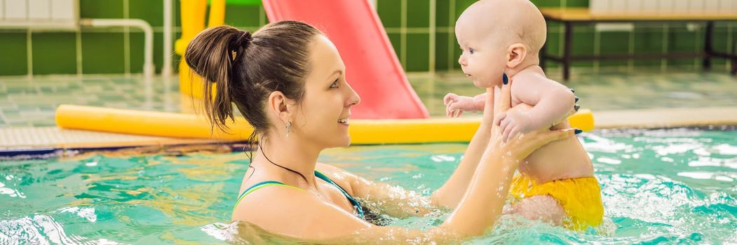 Beautiful mother teaching cute baby girl how to swim in a swimming pool. Child having fun in water with mom. BANNER, LONG FORMAT