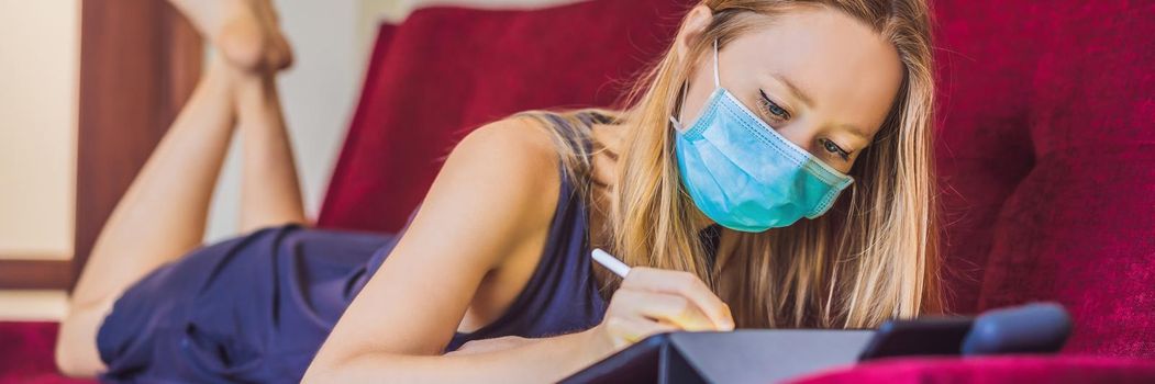 Woman is teaching drawing on a tablet at home in quarantine. Coronovirus, self-isolation. BANNER, LONG FORMAT