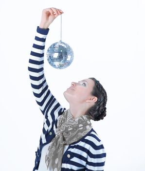 closeup.beautiful young woman holding a mirror ball .photo with copy space