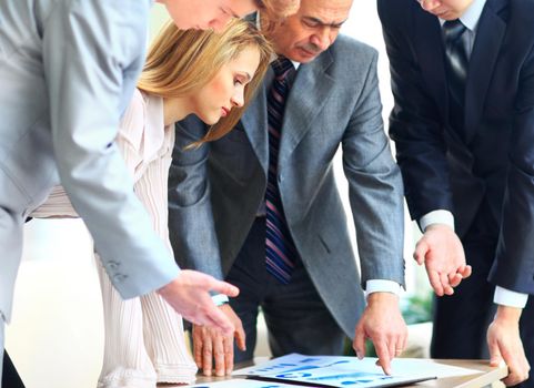 Business team working on their business project together at office