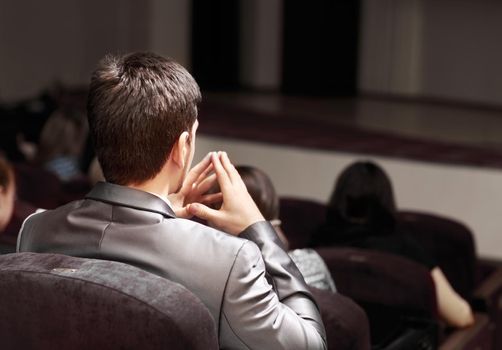 people sitting rear at the business conference