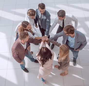 top view. corporate business team showing their unity. photo with copy space