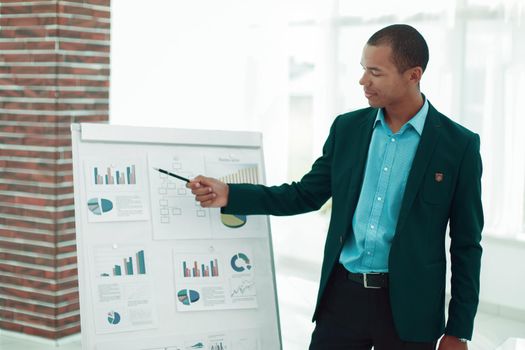 closeup.young businessman making presentation of a new financial project