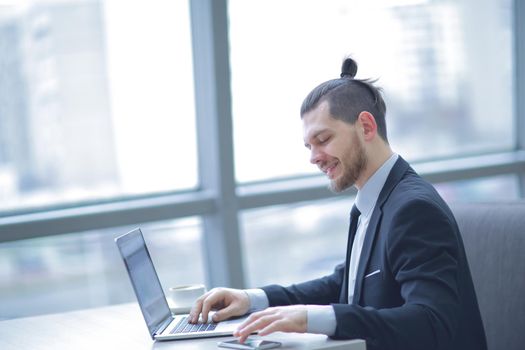 confident businessman working in the office.people and technology