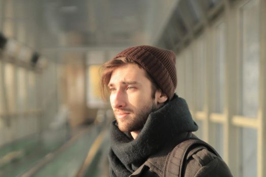 portrait of modern young man . city life.