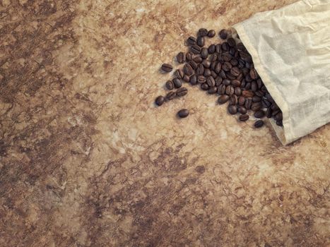 coffee beans on wooden background and empty space