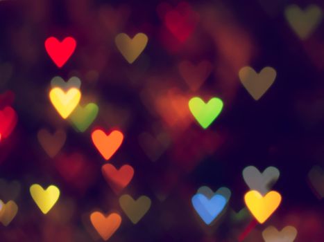 red hearts bokeh as background.