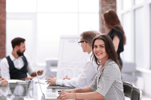 young business woman sitting at office Desk. business concept