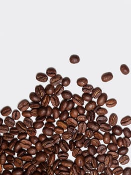 roasted coffee beans on white background.