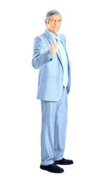 Nice businessman at the age, thumb up. Isolated on a white background.