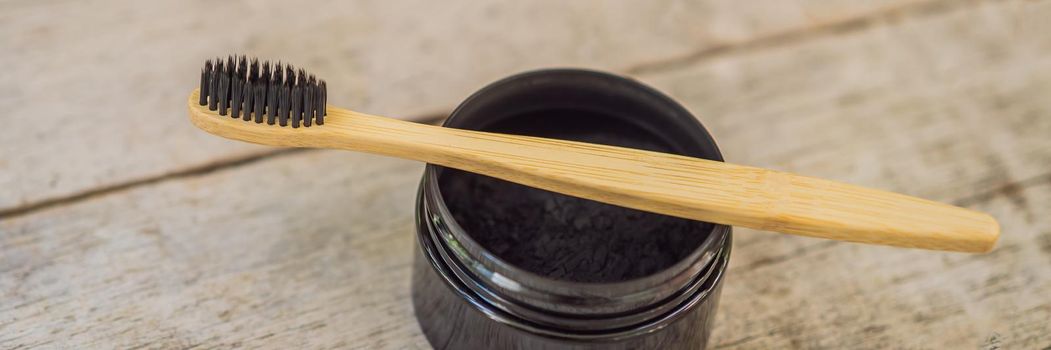 Activated charcoal powder for brushing and whitening teeth. Bamboo eco brush. BANNER, LONG FORMAT