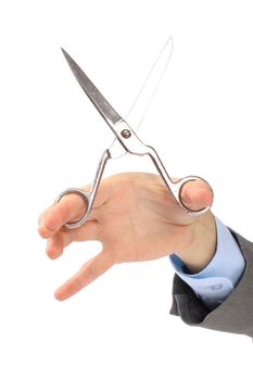 A pair of scissors in his hand the office worker Isolated on white background