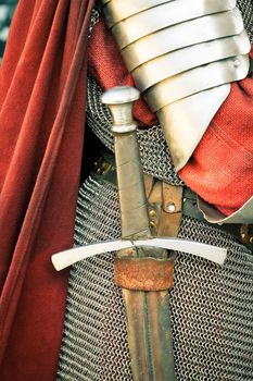 Medieval knight. Close-up of sword and armor