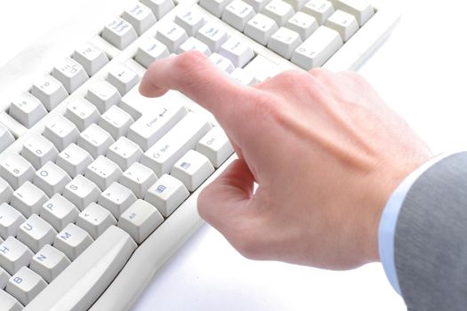 Close-up of secretarys hand touching computer keys during work