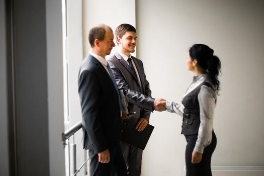 image of a business team discussing the latest financial results
