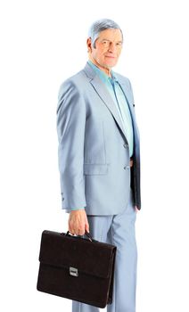 Nice businessman at the age, with a portfolio of. Isolated on a white background.