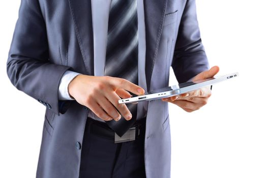 Businessman with finger touching screen of a digital tablet