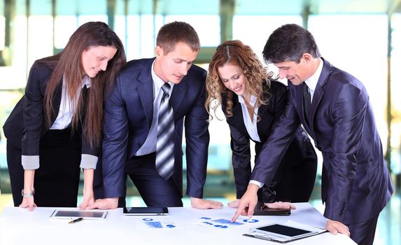 Business team working on their business project together at office