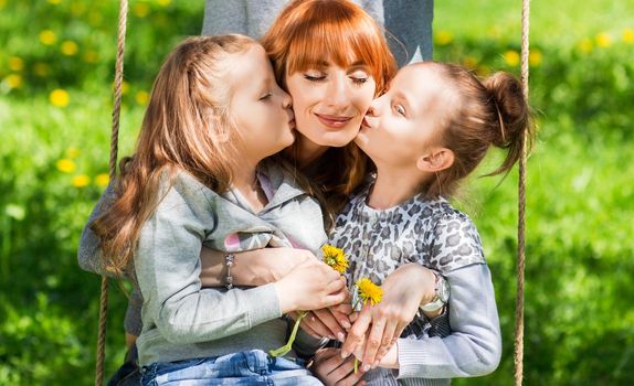 Riendly, cheerful family having a picnic.