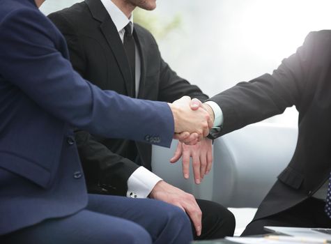 close up.handshake business people at a meeting.concept of partnership
