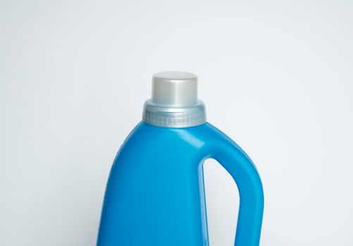 Softener in blue plastic bottle isolated on white background. Bottle with liquid laundry detergent, cleaning agent, bleach or fabric softener. Product design. Mock up