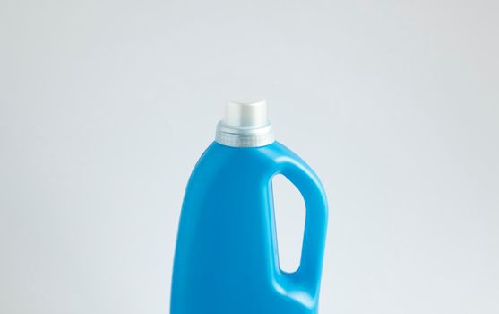 Blue plastic bottles of cleaning products. Mock up