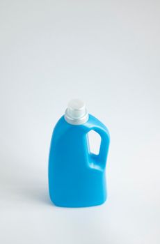 Blue plastic liquid detergent bottle isolated on white background. Laundry container, merchandise template. Product design. Mock up