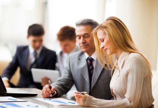 Business team working on their business project together at office