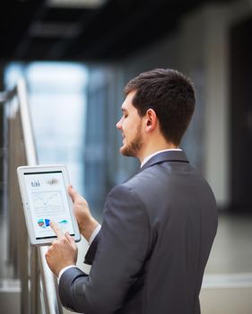 young businessman with a tablet pc, at the office