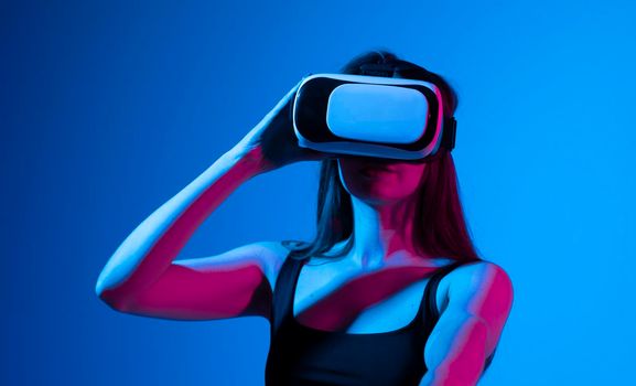 Woman with glasses of virtual reality. Future technology concept