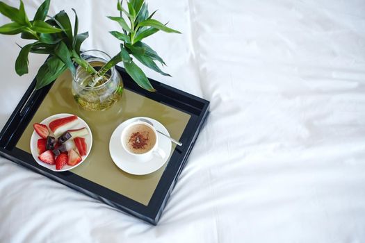 Mood with Coffee in Bed. Beautiful Life. Top View Tray with Fruits and Expresso on White Sheet. Luxury Lifestyle. Good Glamour Morning